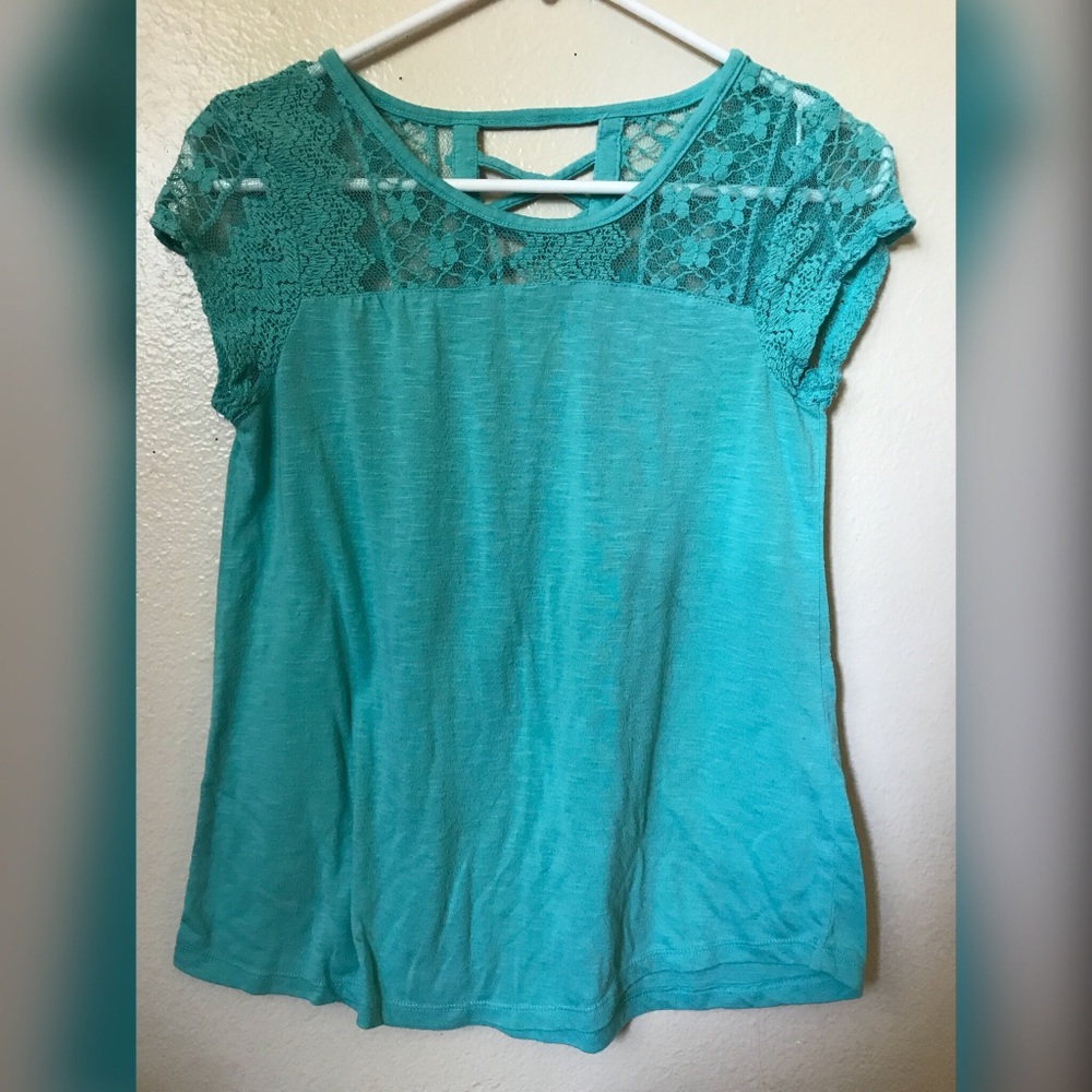 Blue shirt with see through patterns. (Worn once)